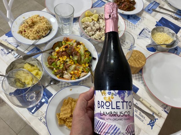 Broletto in hand Broletto Organic Lambrusco with Food